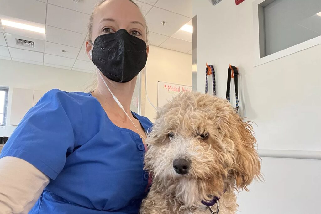 Rescued dog with his veterinarian 