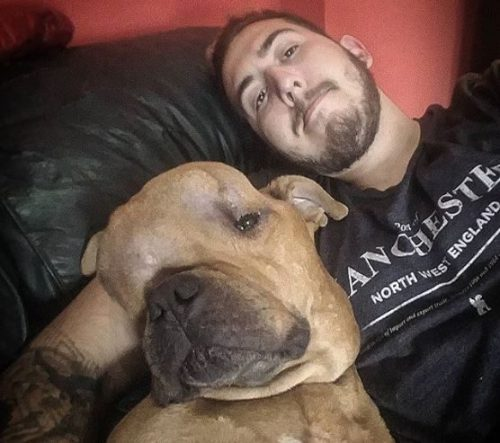 Dog with brain tumor with his owner 